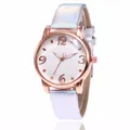 Detailed macro view of the floral patterned dial and rose gold case of this watch - Silver