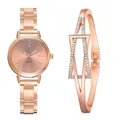 Detail of rose gold quartz watch set with elegant mesh strap and matching bracelet - Rose Gold Watch and Bracelet Set