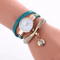 Detailed view of turquoise multi-layer leather strap watch with gold rhinestone charms - Lake Blue
