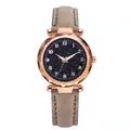 Detail of rose gold case with prism cut glass and starry blue dial quartz watch - Watch / Gray