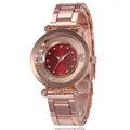 Elegant rose gold women's watch with a deep red dial and moving rhinestones - Red