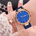 Detailed close-up of a women's quartz watch and sparkling rhinestone star bracelet set - Blue + Bracelet