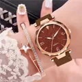 Rose gold quartz watch with starry brown dial and matching star bracelet set on wrist - Brown + Bracelet