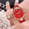 Close-up of starry red quartz watch with rose gold case and matching star bracelet - Red + Bracelet