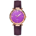 Detailed macro view of multifaceted prism glass and purple glitter dial on rose gold watch - Purple