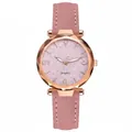Close-up of pink glitter watch dial with rose gold case and quartz movement detail - Pink