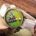 Retro bronze billiards theme quartz watch with white strap on rustic wood base - White