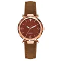 Detail of rose gold quartz watch with brown starry dial and multifaceted glass lens - Brown