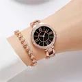 Detail of rose gold watch with Roman numerals and matching diamond heart bracelet - Rose Gold + Bracelet