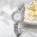 Macro shot of luxury quartz watch with diamond-encrusted bezel and silver wavy case design - Quartz Watch / Silver