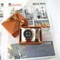 Coffret cadeau montre homme dorée et bracelet tressé noir dans une boîte orange - Watch Bracelet And Gift Box / Or rose