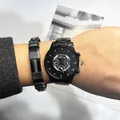 Coffret montre homme en acier noir avec bracelet tressé pour style chic et décontracté - Montre Et Bracelet / Noir