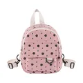 Mini pink corduroy backpack with black floral pattern and adjustable straps for women - Pink