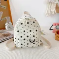 Mini corduroy backpack in off-white with black floral print and front pocket - Flower Style / White