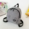 Mini-Rucksack aus grauem Cord mit Smile-Stickerei und schwarzen verstellbaren Gurten - Grau