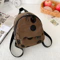 Brown corduroy mini backpack with black polka dots and dual zipper closure system - Brown