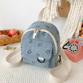 Zaino celeste in velluto a coste con stampa smiley, tasca anteriore e cinghie color crema - Blu