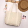 Bolso tote de lona beige de gran capacidad con bolsillo frontal colgado en gancho - Blanco Roto