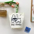 Off-white canvas bucket bag with cute cartoon dog illustration and green handle - White/Green Dog (Magnetic)