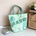 Light green canvas bucket bag featuring cute dinosaur illustration and snap closure - Bright Future