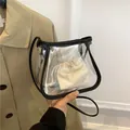 Borsa a tracolla trasparente in PVC con bordo nero e custodia interna in tela - Nero