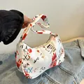 Minimalist white shoulder bag with colorful graffiti prints and a matching strap - Abstract Graffiti Print / Red