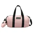 Pink Boston style crossbody bag with black straps and matching small round coin purse - Pink