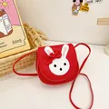 Cute red rabbit shoulder bag for kids with white bunny decal and faux leather finish - Red