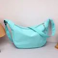Minimalist light blue waffle fabric crescent bag with adjustable wide shoulder strap - Blue