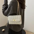 Elegant white tweed plaid crossbody bag with gold chain strap and metallic lock clasp - White