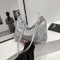 Borsa tote argento metallizzato con trama plissettata e manici a nodo eleganti - Grigio