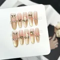 Dettaglio di unghie finte fatte a mano con effetto occhi di gatto e motivo coniglietto - Extra Piccolo (XS) / Stile Coniglietto Sfumato Rosa Nudo Occhio di Gatto Oro Champagne (W463)