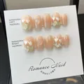 Unghie finte artigianali sfumate pesca con tulipani 3D e cuori su scheda display - Grande (L)