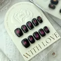 Set di unghie finte artigianali cat-eye nere e rosa con effetto galassia scintillante - Grande (L) / Occhio di Gatto Inseguimento della Luce Nero Rosa