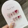 Short square raspberry red press-on nails with ruby heart and glitter gemstone accents - Large (L)