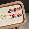 Handmade Christmas press-on nails with 3D snowman, tree designs and red festive patterns - XS / Short Round