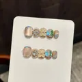 Uñas postizas artesanales con flores 3D, base champán ojo de gato y pedrería aurora brillante - XS / Flor de Cristal de Hielo-Corto Redondo (3162)