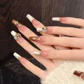 Faux ongles faits main œil de chat avec touches marron et strass de luxe brillants - XS / Style Coffin Extra Long