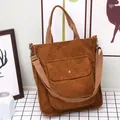 Brown corduroy tote bag with adjustable shoulder strap and large front snap pocket - Brown