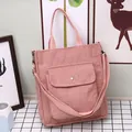 Pink corduroy tote bag with front pocket and shoulder strap for women - Pink