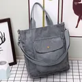 Gray corduroy tote bag with front button pocket and adjustable shoulder strap - Gray