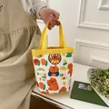 Sac seau en toile blanche avec imprimés tigres oranges et anses jaunes vives - Jaune