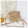 Detailed close-up of brown plush bear crossbody bag with teddy fleece and fine embroidery - Tan