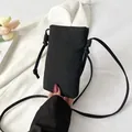 Minimalistische zwarte canvas mini crossbody tas voor telefoon met dunne schouderriem - Zwart