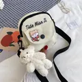 Beige canvas crossbody bag with cute teddy bear pendant and cartoon girl brooch - Off White