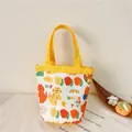 White canvas bucket tote with cartoon cat print and bright yellow nylon handles - Tiger Yellow