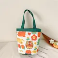 Canvas bucket bag with green handles and cute orange tiger print for lunch storage - Tiger Green