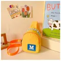 Kids casual chest bag in bright yellow with orange strap and blue M letter patch - Yellow