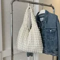 White bubble texture hobo shoulder bag with pleated popcorn fabric and a minimalist design - Pink