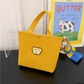 Cute yellow corduroy mini tote bag with bear embroidery and functional snap button - Yellow